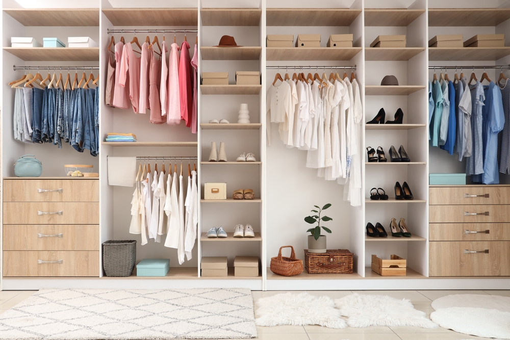 Wardrobe,With,Different,Clothes,And,Accessories,In,Dressing,Room